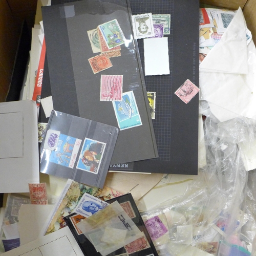 710 - Stamps; a box of stamps, covers, etc., loose and in albums