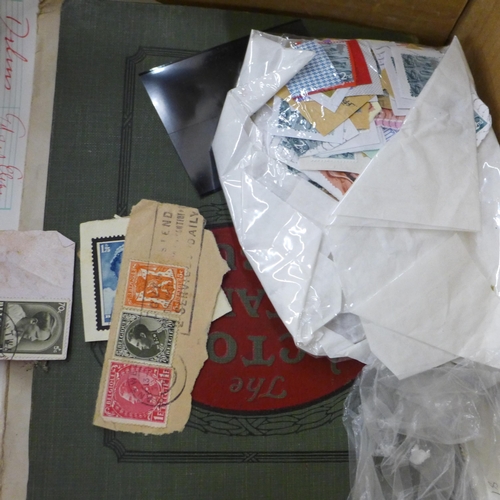 710 - Stamps; a box of stamps, covers, etc., loose and in albums