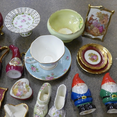 711 - A box of decorative china and ornaments including a Carlton Ware Crinoline Lady cruet, Royal Worcest... 