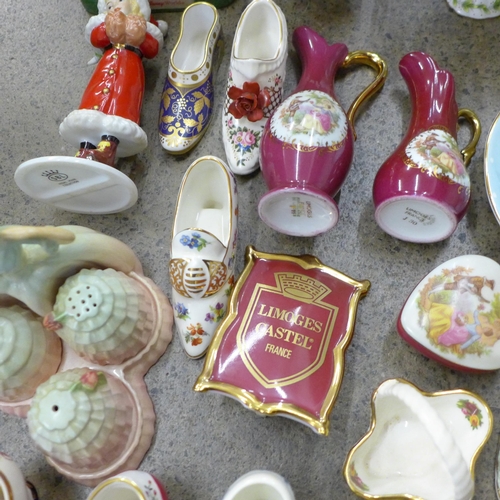 711 - A box of decorative china and ornaments including a Carlton Ware Crinoline Lady cruet, Royal Worcest... 