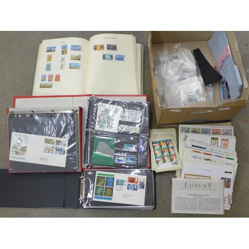 714 - Stamps; a large box of GB stamp albums, covers, presentation packs, etc.