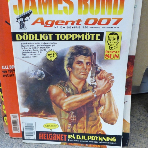 716 - A collection of James Bond magazines, poster, James Bond related Playboy issues, etc.