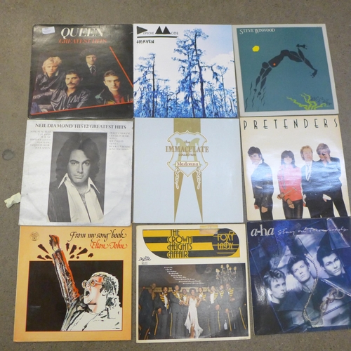 723 - A collection of LP records including Queen, Depeche Mode, Pretenders, A-Ha, etc.