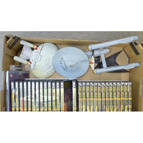 725 - A collection of Star Trek DVDs (full set) and four models of USS Enterprise