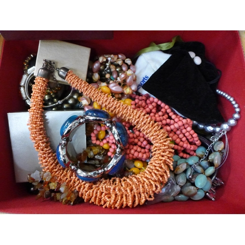 750 - A large box of costume jewellery