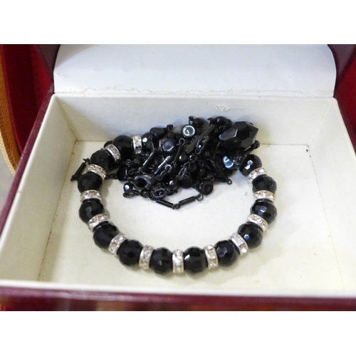 750 - A large box of costume jewellery