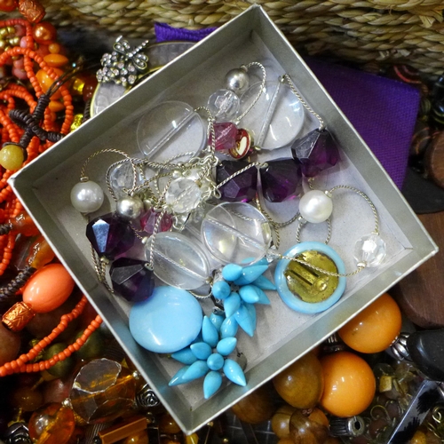 750 - A large box of costume jewellery