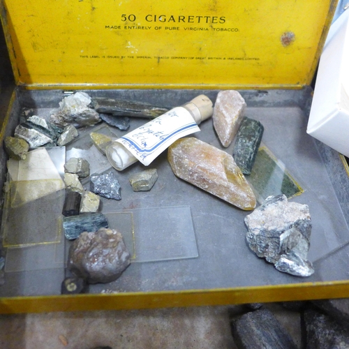 764 - A box of mineral samples, microscope slides and two test tubes