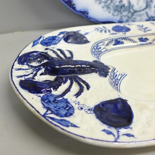 770 - A 19th Century lobster serving plate, a/f, restored, a flow blue serving plate, chip to edge and one... 