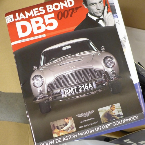 776 - James Bond Aston Martin kit no. 1 parts and BMW James Bond magazines including foreign language, etc... 