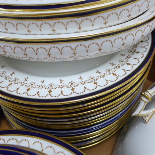 778 - A Royal Crown Derby part dinner service, plates and soup bowls, two medium oval tureens, 36 pieces a... 