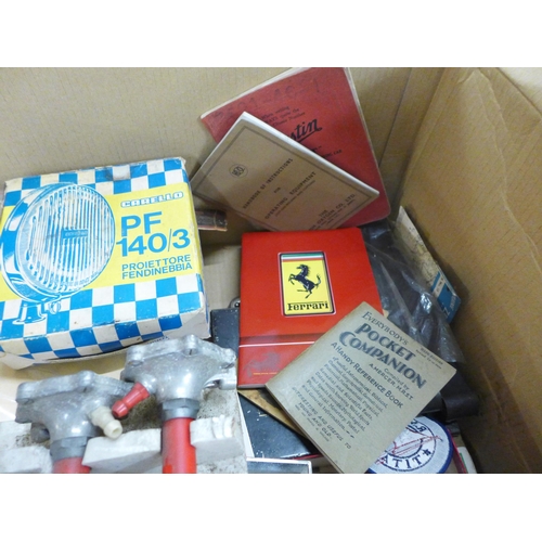 779 - A box of vintage motor car items including 1970s air horn set, Carello spotlight, Osram bulbs and pa... 