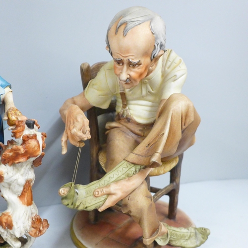 780 - Two Capodimonte figures, man mending his sock and man with dog, both signed