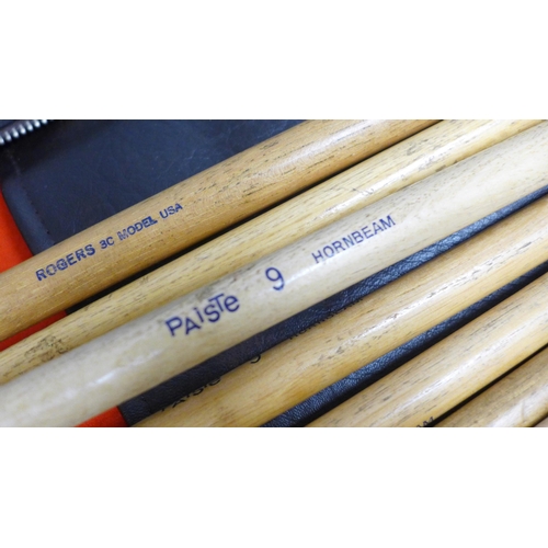 782 - A vintage professional Pearl drumstick bag, complete with seven sets of drumsticks including Paiste ... 