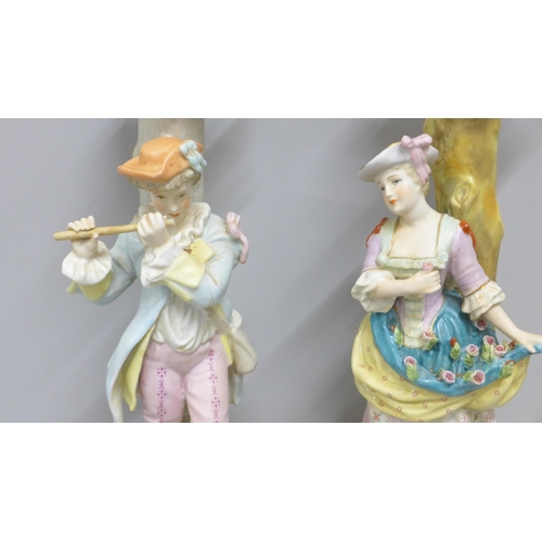 783 - A pair of continental porcelain figural candlesticks, 40cm **PLEASE NOTE THIS LOT IS NOT ELIGIBLE FO... 