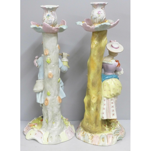 783 - A pair of continental porcelain figural candlesticks, 40cm **PLEASE NOTE THIS LOT IS NOT ELIGIBLE FO... 