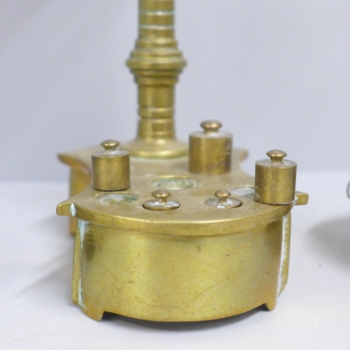 786 - A set of brass balance scales and weights, two weights missing