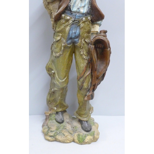 788 - A resin model of a cowboy, 53cm