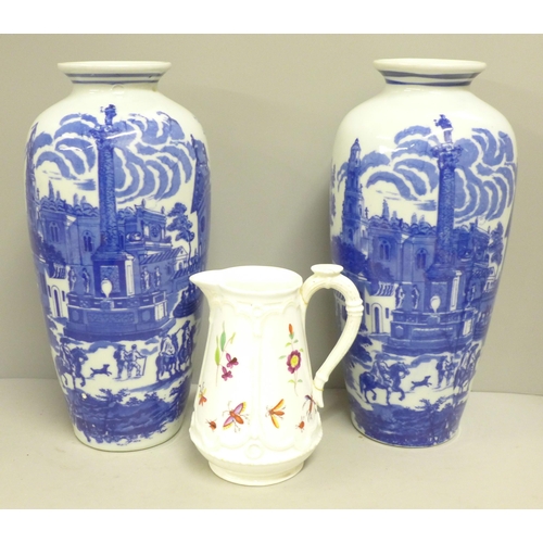 790 - A pair of blue and white vases and a pottery jug