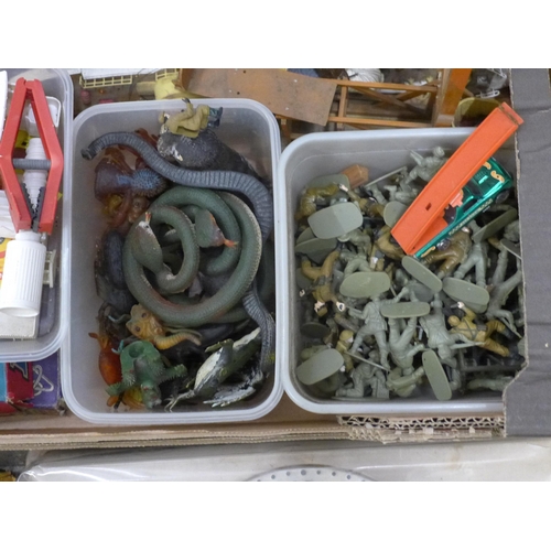 798 - A box of toys, games, models from 1960s onwards including plastic soldiers, rubber animals and snake... 