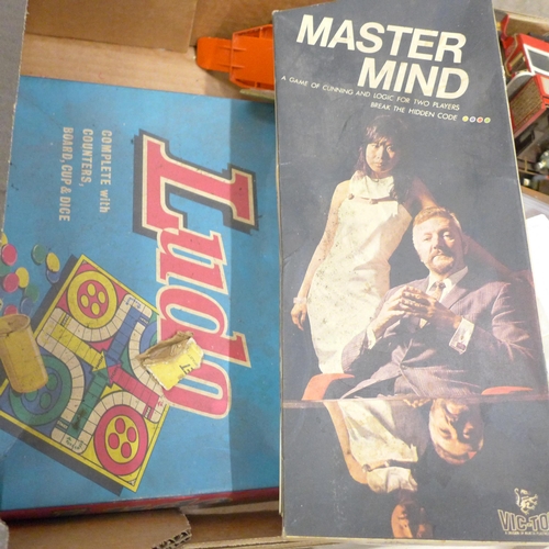 798 - A box of toys, games, models from 1960s onwards including plastic soldiers, rubber animals and snake... 