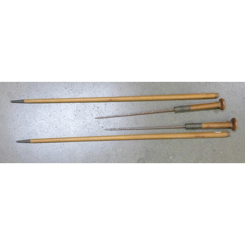 801 - Two Maldives sword sticks, tops a/f