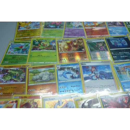 809 - Thirty holo/reverse holo Pokemon cards