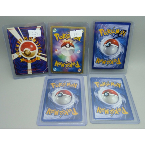 821 - Five holographic vintage Pokemon cards, English and Japanese pocket monsters and German 1st edition ... 