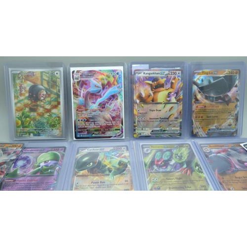 824 - Ten ex, promo, V max holographic Pokemon cards, and twenty other Pokemon cards