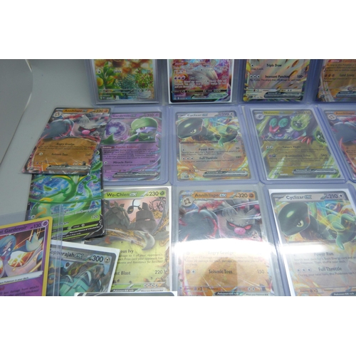 824 - Ten ex, promo, V max holographic Pokemon cards, and twenty other Pokemon cards