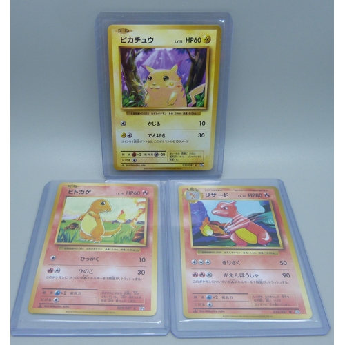 825 - Three Japanese first edition Pokemon cards, Pikachu, Charmander and Charmeleon