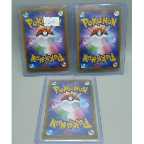 825 - Three Japanese first edition Pokemon cards, Pikachu, Charmander and Charmeleon