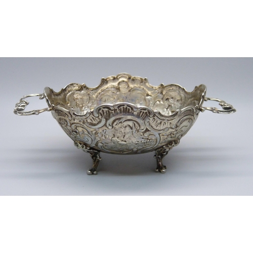 837 - An embossed two handle German 800 silver dish, 108g