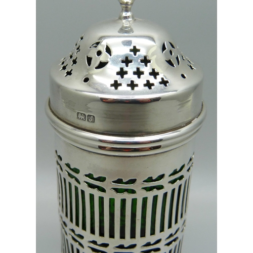 846 - An Edwardian silver shaker with green glass liner, Chester 1909, 67g