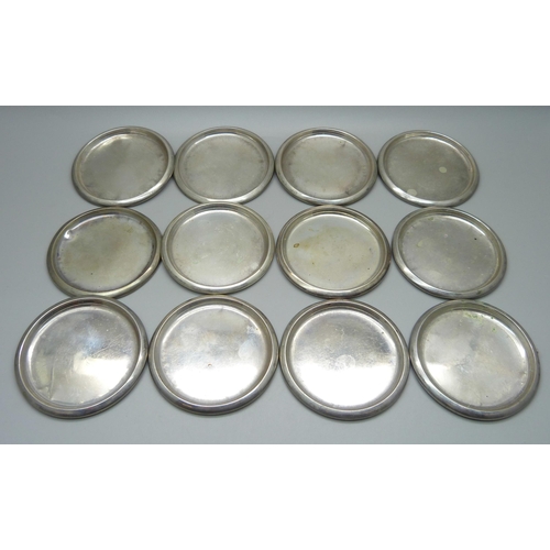 850 - A set of twelve Norwegian silver dishes, marked 830, 183g, 7cm