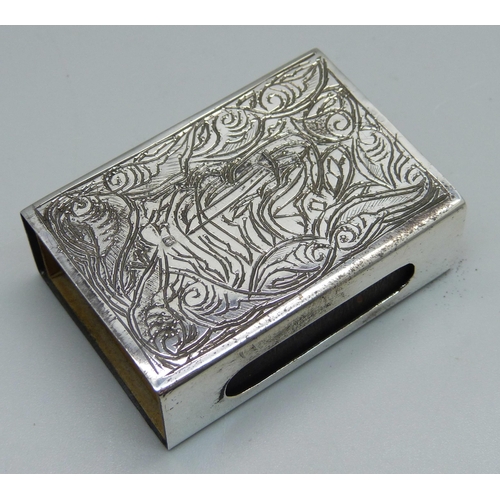 854 - A white metal match box holder, Middle East mark