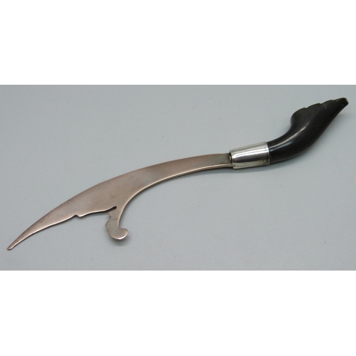 855 - An Eastern letter opener with carved horn handle, 13cm