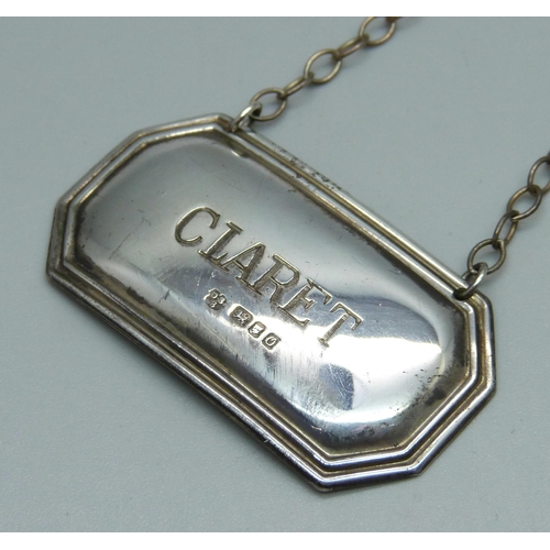 856 - A silver 'claret' bottle label