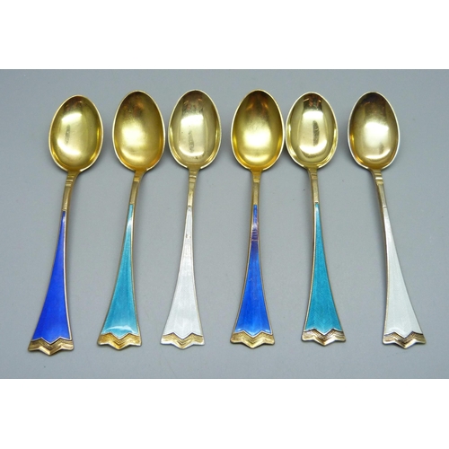 858 - A set of six silver gilt and enamel coffee spoons, stamped 925S, enamel a/f on one white and one roy... 