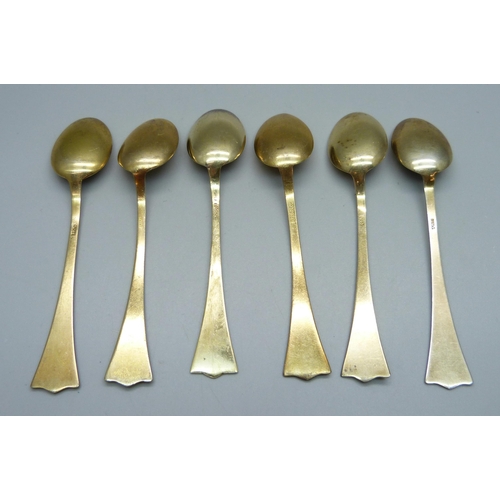 858 - A set of six silver gilt and enamel coffee spoons, stamped 925S, enamel a/f on one white and one roy... 