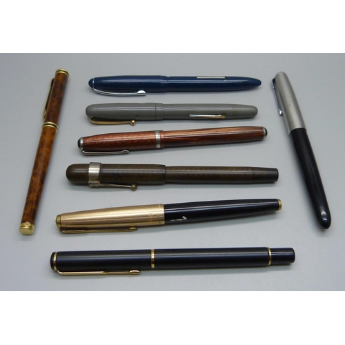 870 - A Swan pen with 14ct gold nib and seven other pens