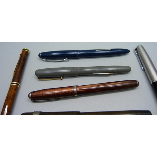 870 - A Swan pen with 14ct gold nib and seven other pens