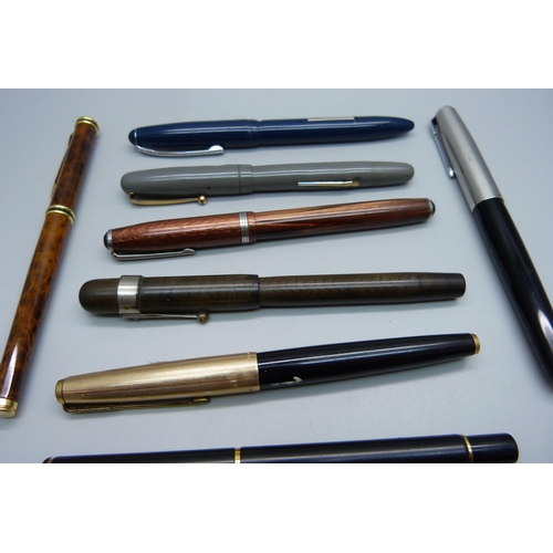 870 - A Swan pen with 14ct gold nib and seven other pens