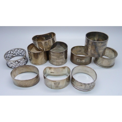 872 - Ten silver napkin rings including two pairs, 339g