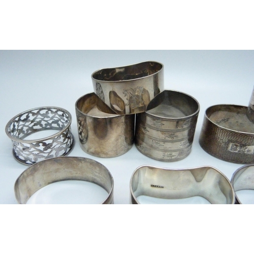 872 - Ten silver napkin rings including two pairs, 339g