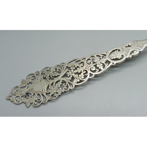 873 - A Victorian pierced silver spoon, London 1899, 63g, 25cm