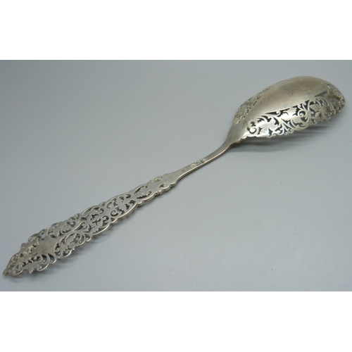 873 - A Victorian pierced silver spoon, London 1899, 63g, 25cm