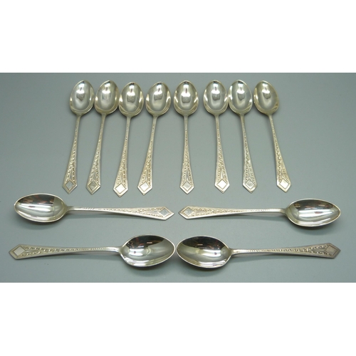 876 - A set of twelve silver tea spoons, Sheffield 1907, 186g