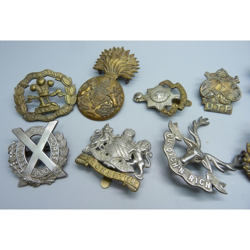 883 - Eleven military cap badges including UTP Upper Thames Patrol Home Guard, Manchester, Royal Sussex, R... 