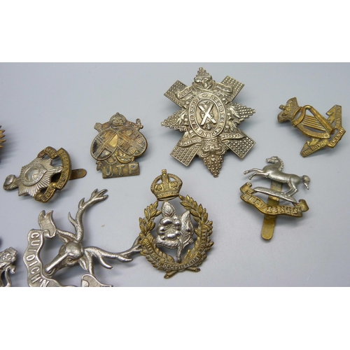 883 - Eleven military cap badges including UTP Upper Thames Patrol Home Guard, Manchester, Royal Sussex, R... 